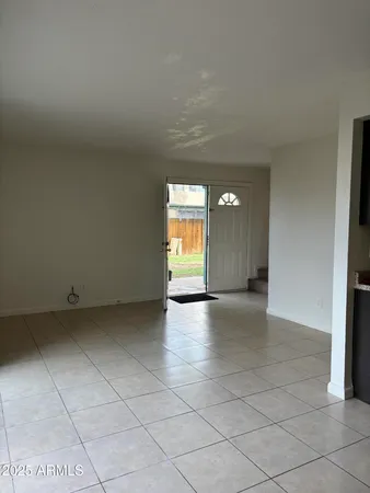 a view of a hallway with a window