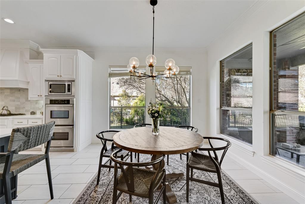 15 Falcons View Pass Heath, TX 75032 - Photo 13 of 38 a dining room with furniture and window