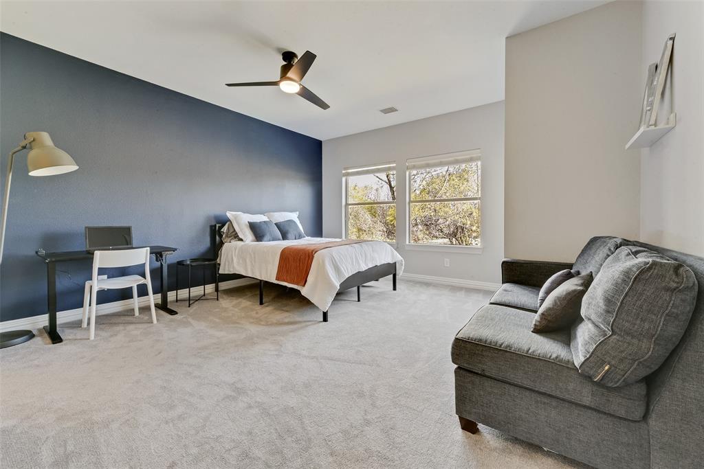 15 Falcons View Pass Heath, TX 75032 - Photo 22 of 38 a living room with furniture and a window