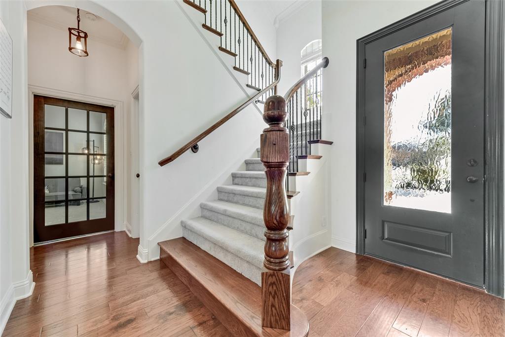 15 Falcons View Pass Heath, TX 75032 - Photo 3 of 38 a view of entryway with wooden floor and front door