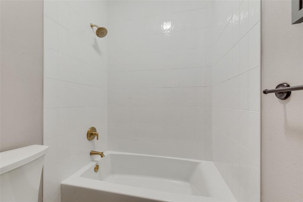 15 Falcons View Pass Heath, TX 75032 - Photo 31 of 38 a bathroom with a bathtub