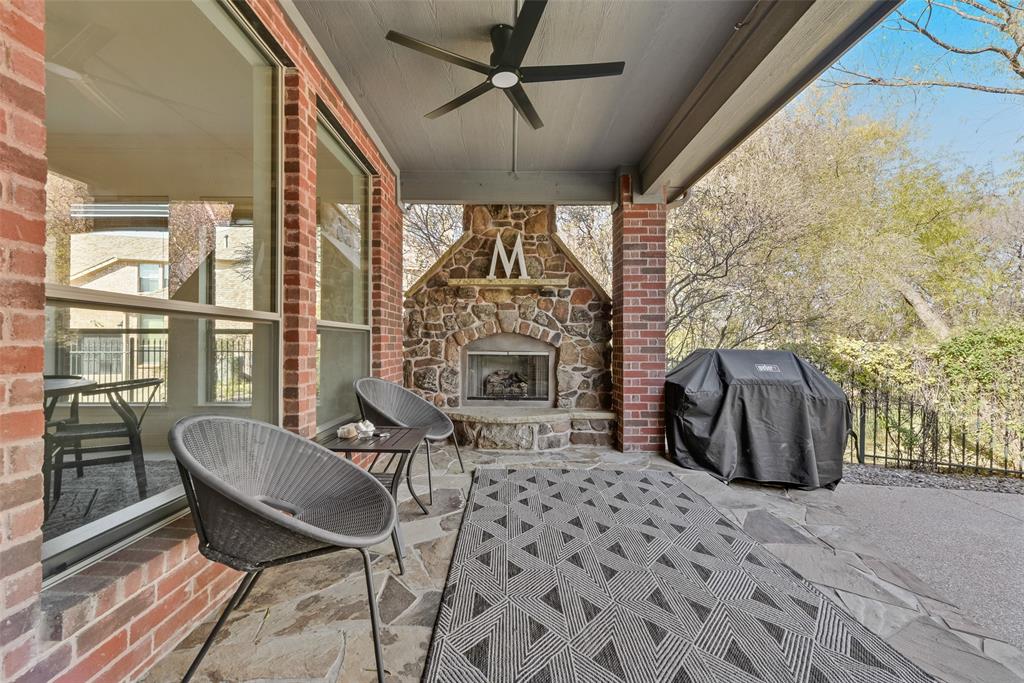 15 Falcons View Pass Heath, TX 75032 - Photo 33 of 38 a view of a livingroom with furniture window and wooden floor