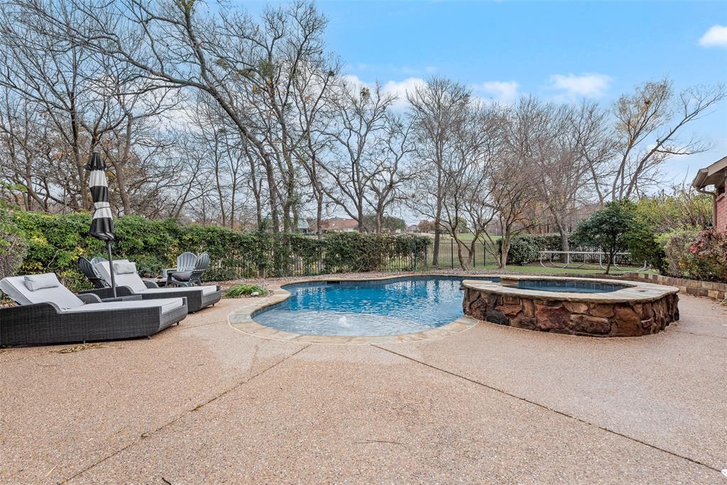 15 Falcons View Pass Heath, TX 75032 - Photo 35 of 38 a view of a swimming pool with a yard