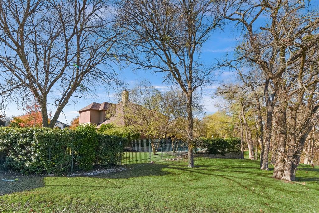 15 Falcons View Pass Heath, TX 75032 - Photo 37 of 38 a big yard with large trees