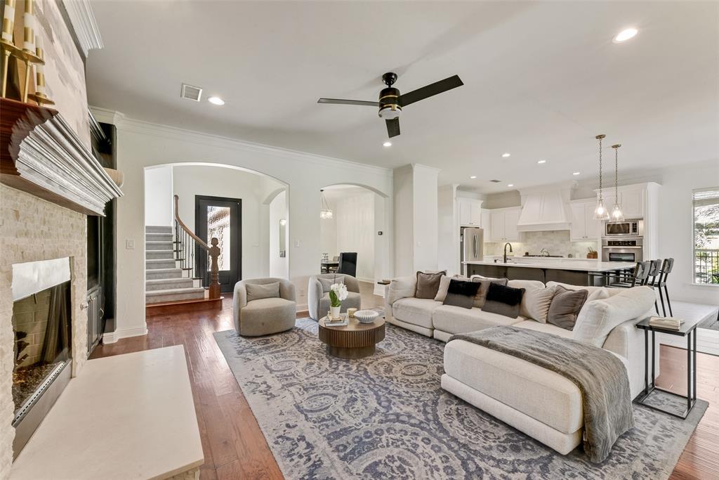 15 Falcons View Pass Heath, TX 75032 - Photo 7 of 38 a living room with furniture and a fireplace