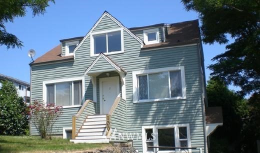 100 Northwest 3rd Place Renton, WA 98057 - Photo 1 of 18 a view of a house with a yard and potted plants