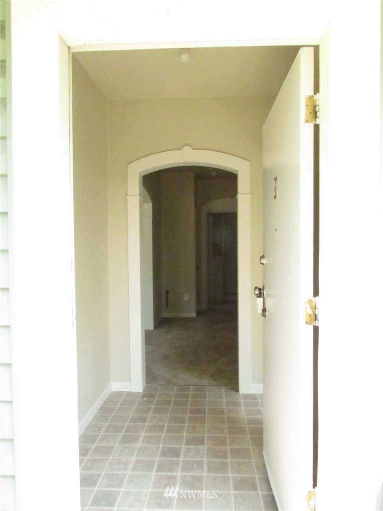100 Northwest 3rd Place Renton, WA 98057 - Photo 2 of 18 a view of a hallway with closet