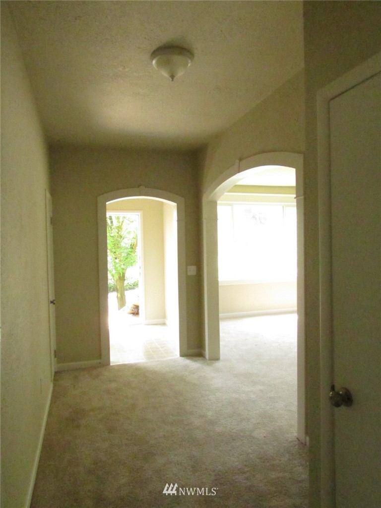 100 Northwest 3rd Place Renton, WA 98057 - Photo 12 of 18 a view of an empty room and a window