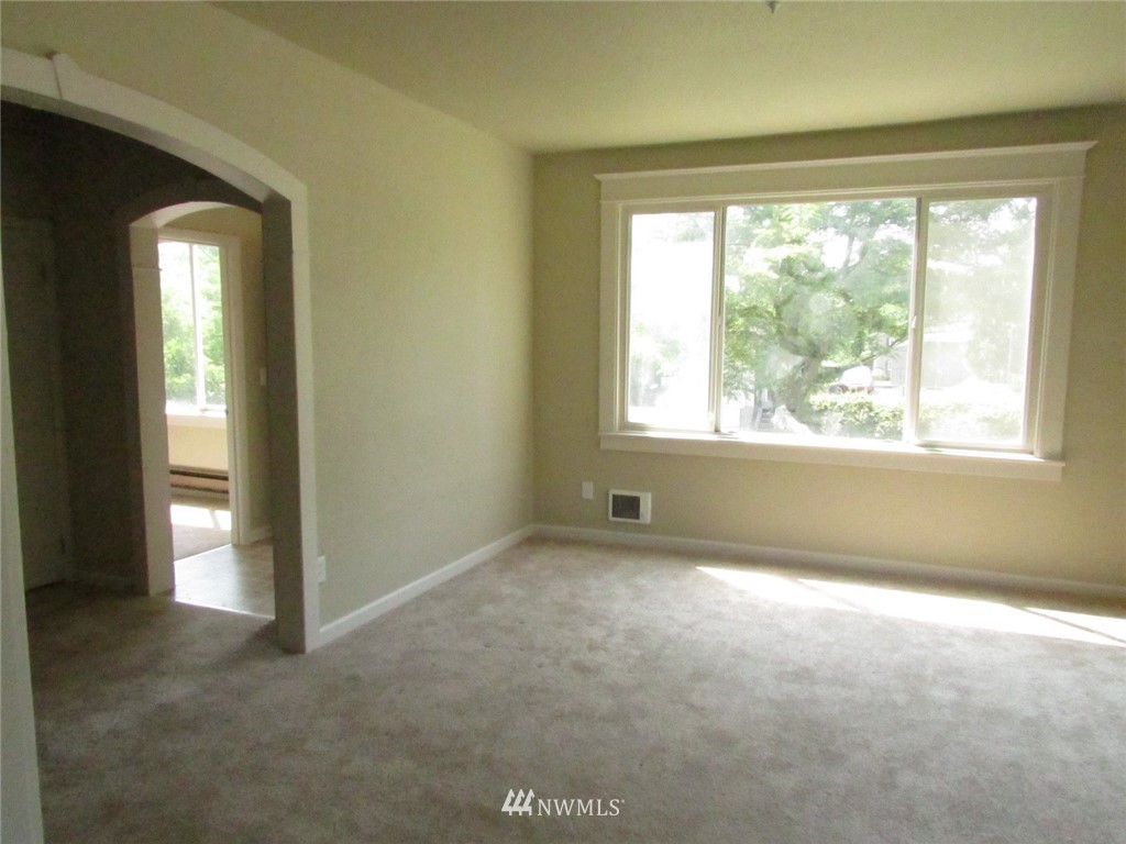 100 Northwest 3rd Place Renton, WA 98057 - Photo 18 of 18 a view of an empty room with a window
