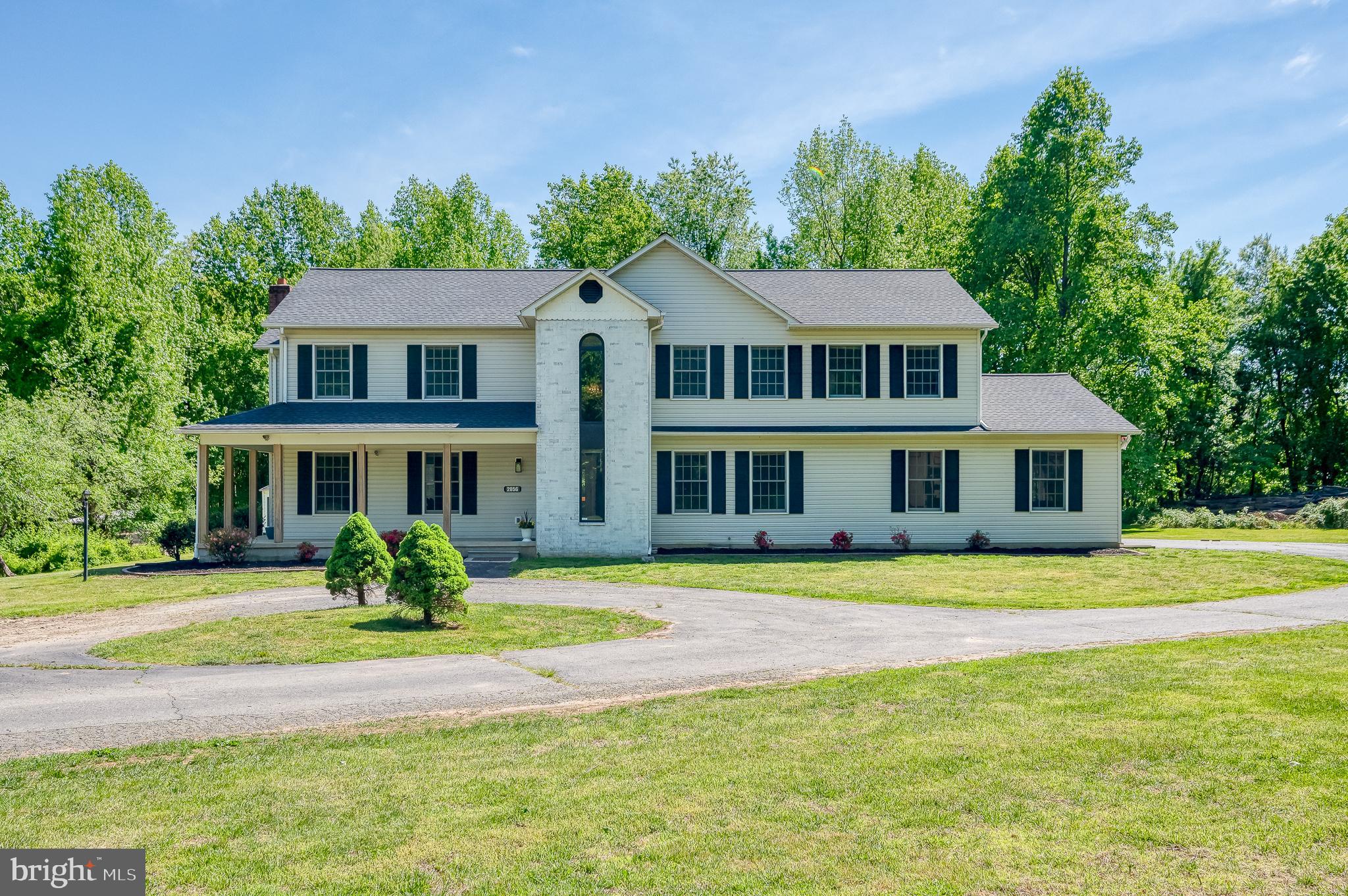 2056 Chapel Road Havre de Grace, MD 21078 - Photo 103 of 120 a front view of a house with a garden