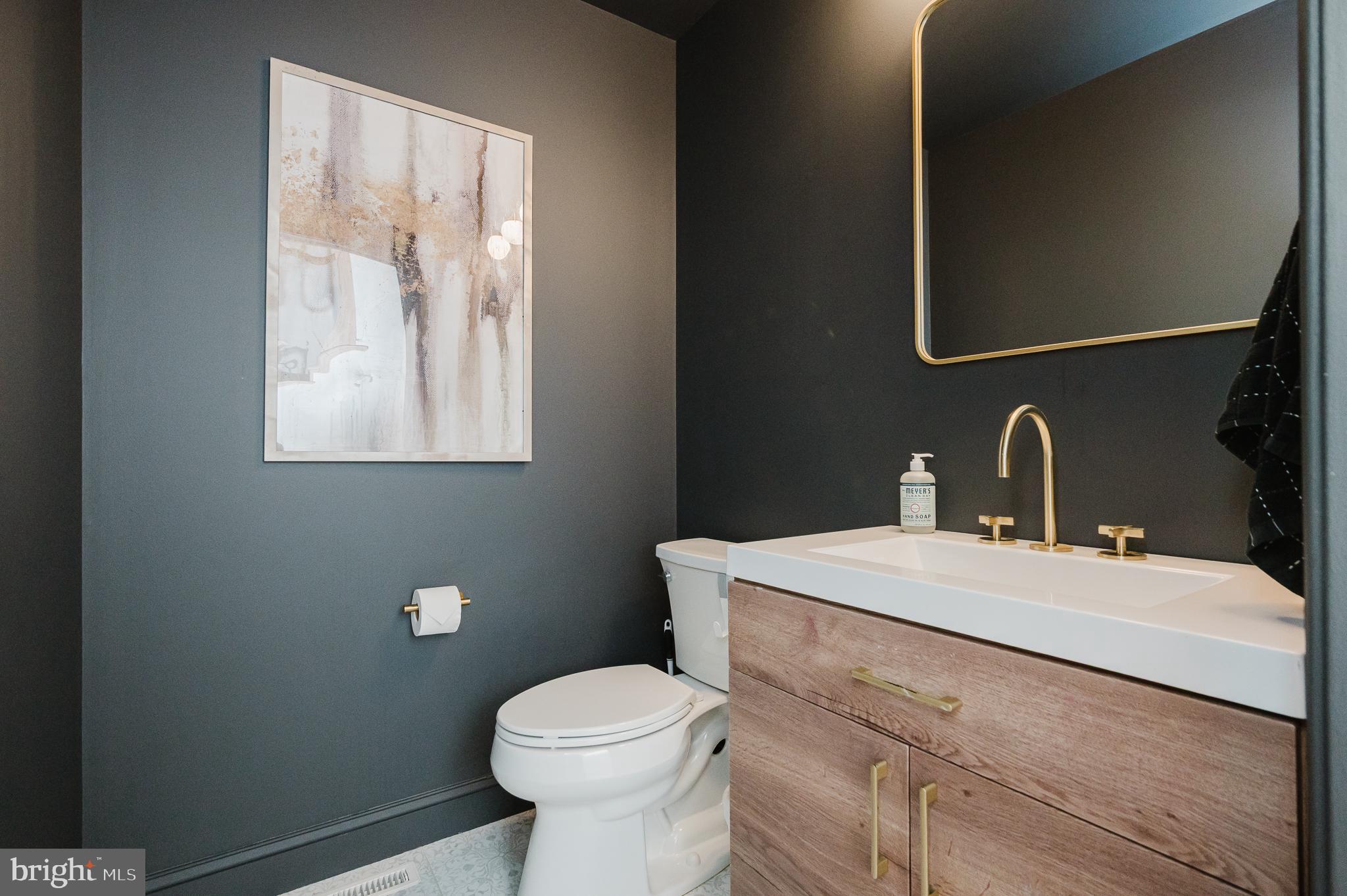 2056 Chapel Road Havre de Grace, MD 21078 - Photo 12 of 120 a bathroom with a sink mirror and toilet