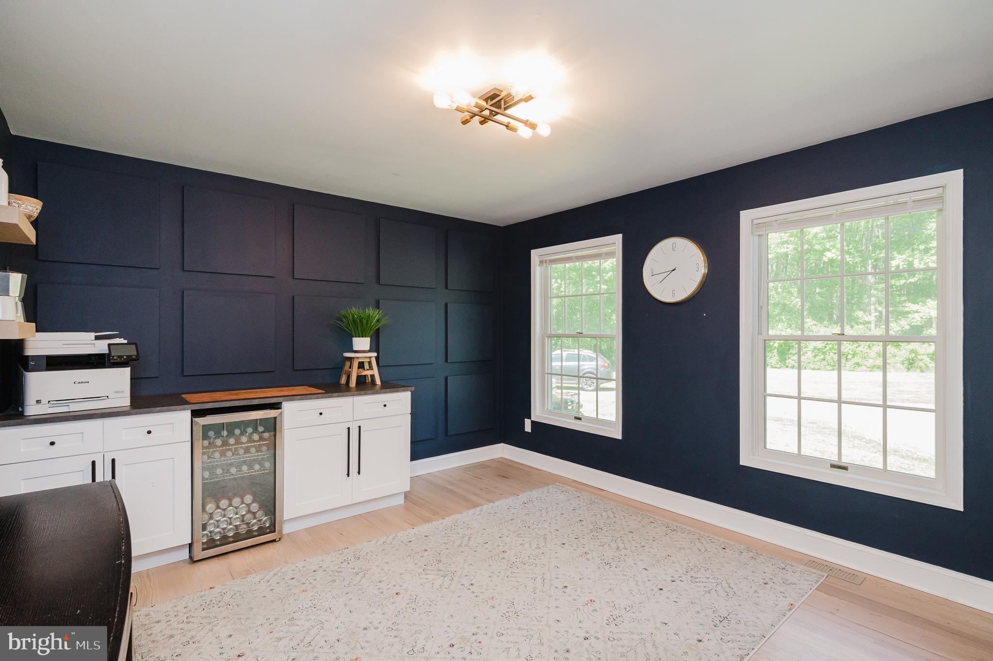2056 Chapel Road Havre de Grace, MD 21078 - Photo 16 of 120 a kitchen with stainless steel appliances granite countertop a stove a sink dishwasher and white cabinets with wooden floor