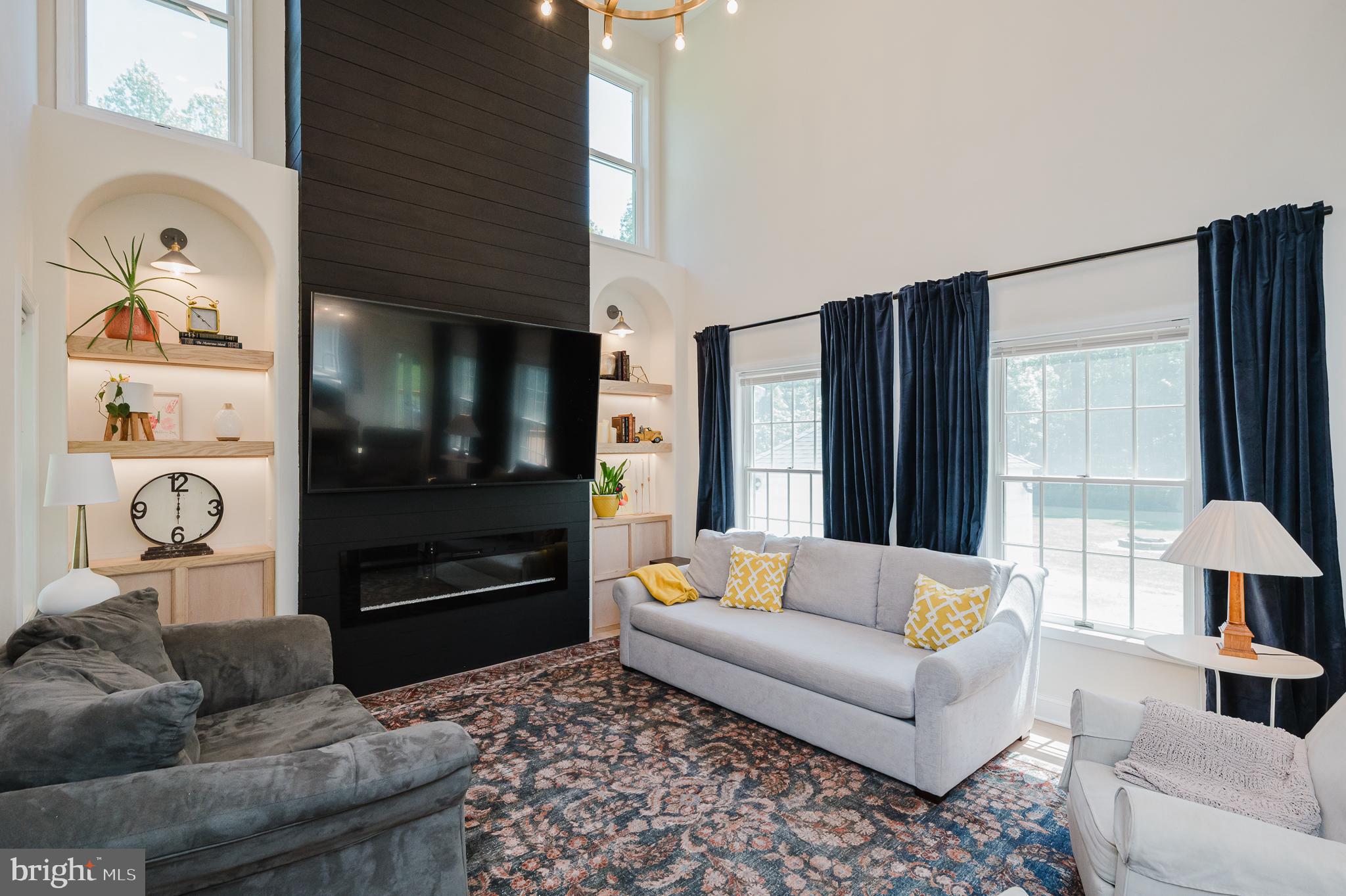 2056 Chapel Road Havre de Grace, MD 21078 - Photo 20 of 120 a living room with furniture and a lamp