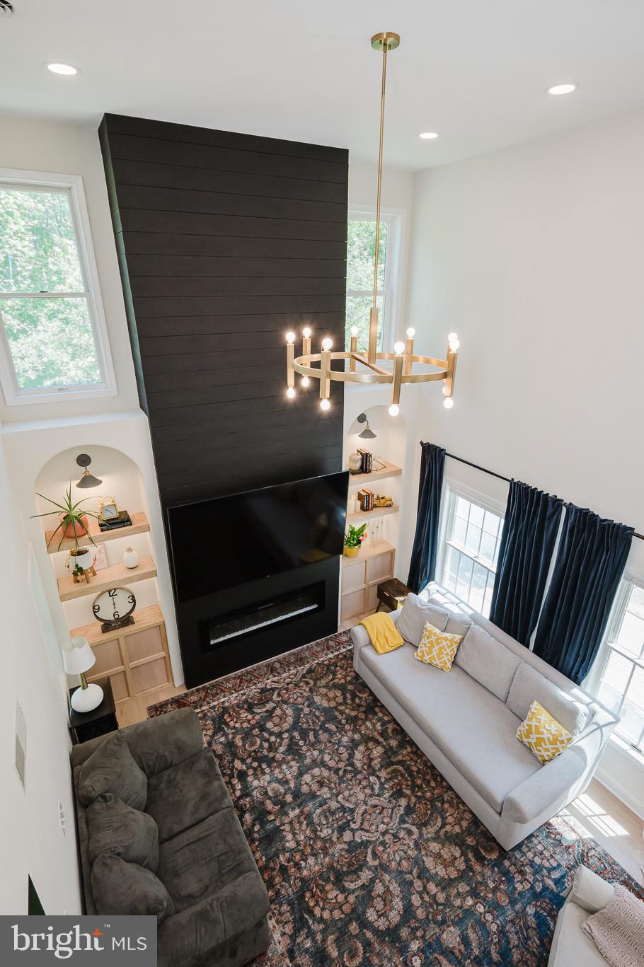 2056 Chapel Road Havre de Grace, MD 21078 - Photo 24 of 120 a living room with furniture and a fireplace