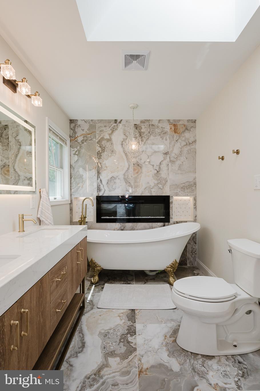 2056 Chapel Road Havre de Grace, MD 21078 - Photo 55 of 120 a bathroom with a toilet a sink and a bathtub