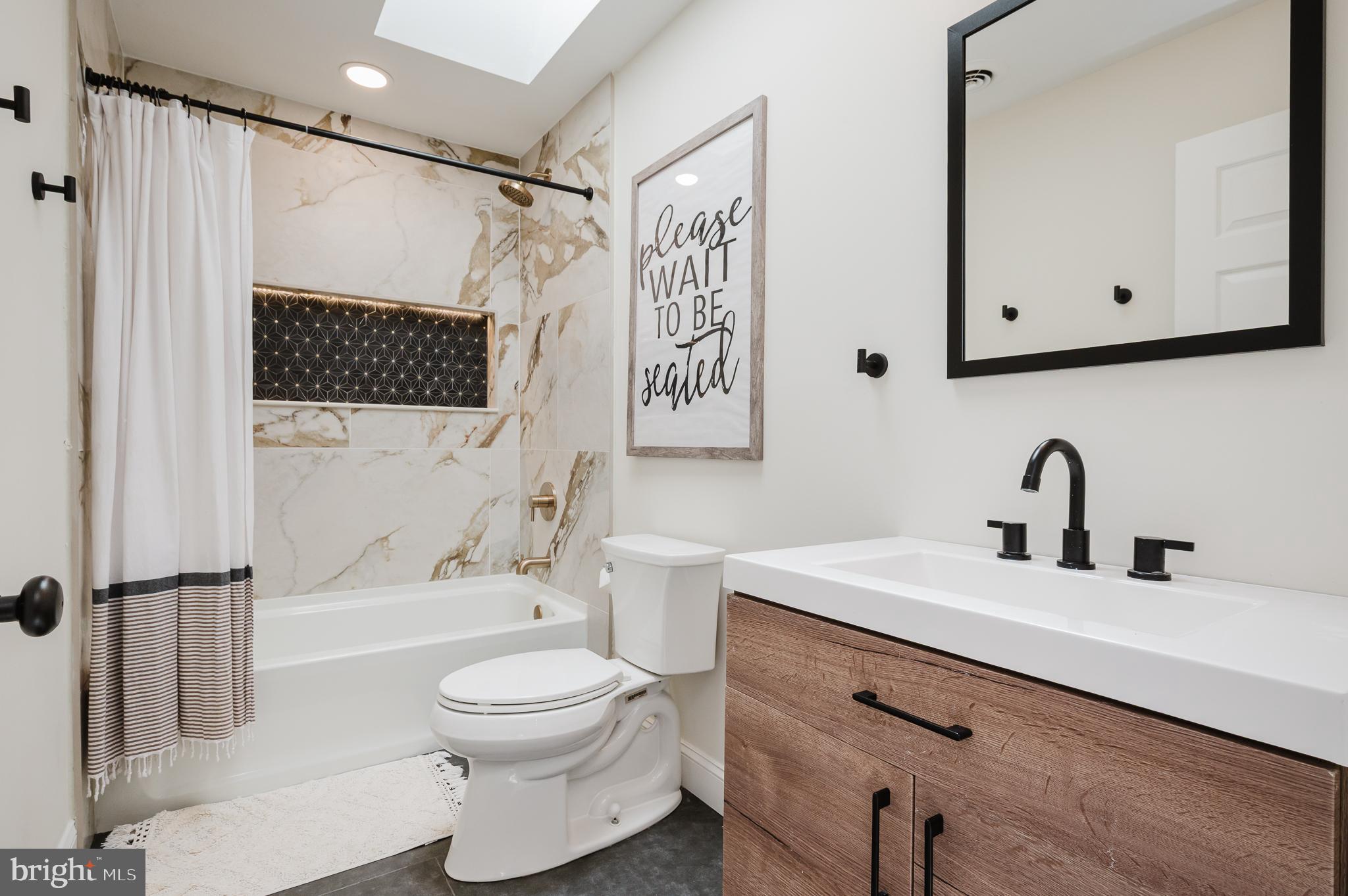 2056 Chapel Road Havre de Grace, MD 21078 - Photo 60 of 120 a bathroom with a sink a toilet and shower