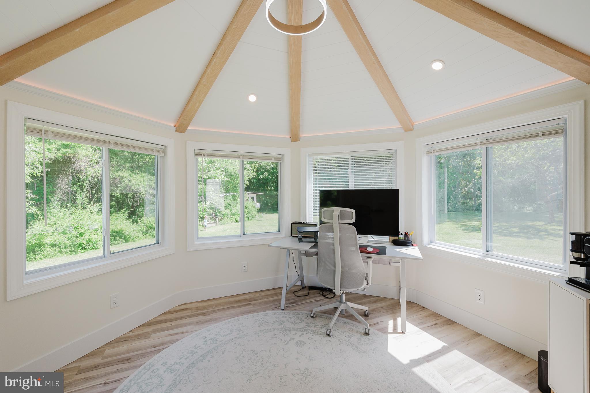 2056 Chapel Road Havre de Grace, MD 21078 - Photo 79 of 120 a view of a workspace with furniture and a window