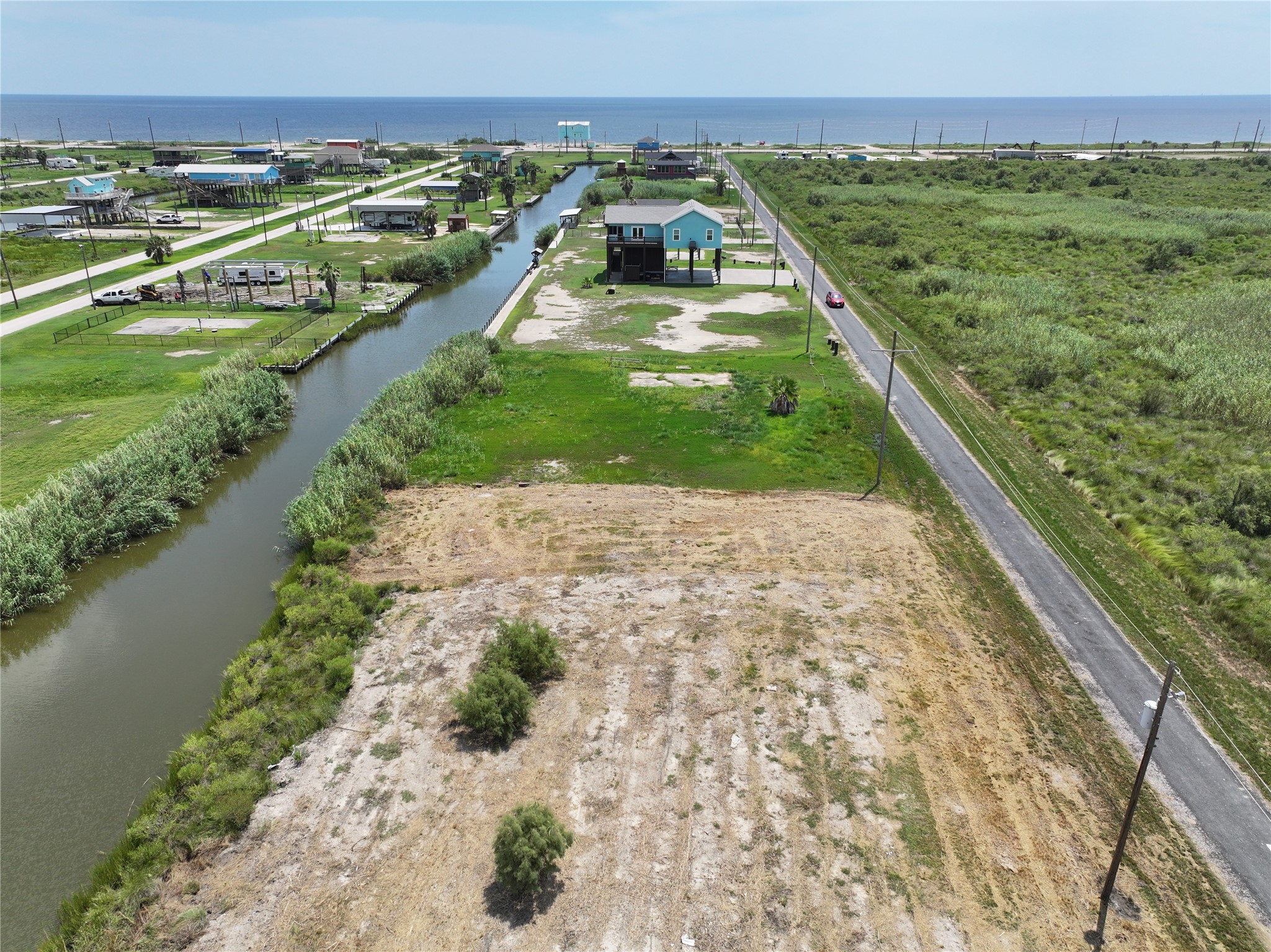 0 Pennington Port Bolivar, TX 77650 - Photo 3 of 7 a view of a garden with an outdoor space