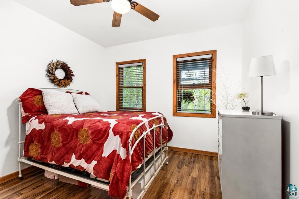 4471 South Rockmont Road South Range, WI 54874 - Photo 28 of 48 Bedroom featuring ceiling fan and dark hardwood / wood-style floors