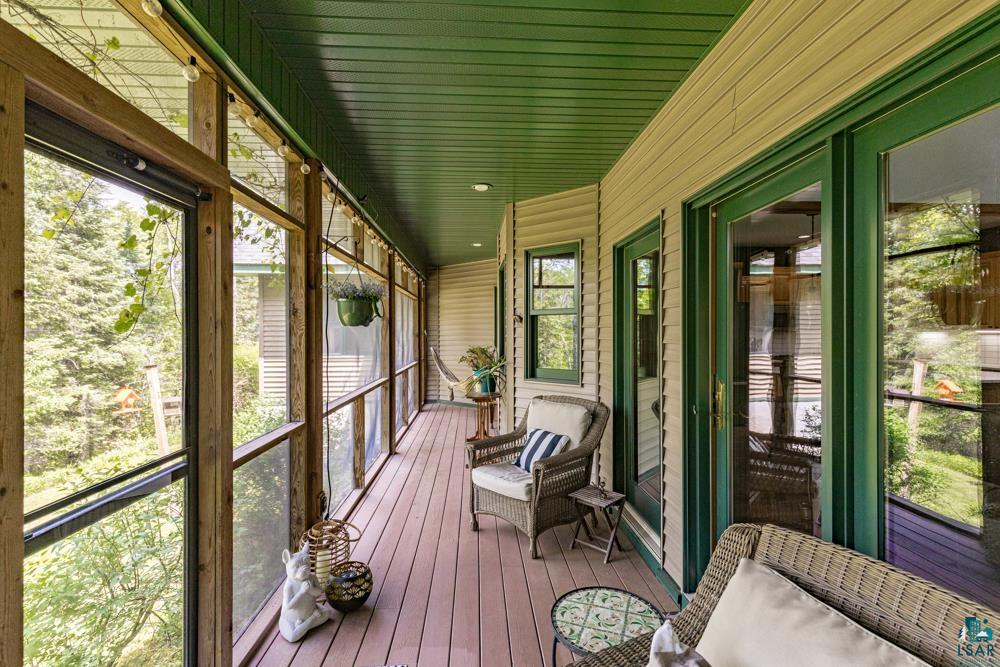 4471 South Rockmont Road South Range, WI 54874 - Photo 33 of 48 Sunroom / solarium featuring a healthy amount of sunlight and wooden ceiling