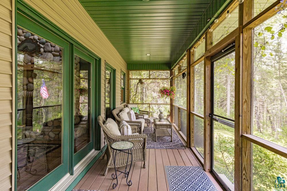 4471 South Rockmont Road South Range, WI 54874 - Photo 34 of 48 Unfurnished sunroom with wooden ceiling and a wealth of natural light