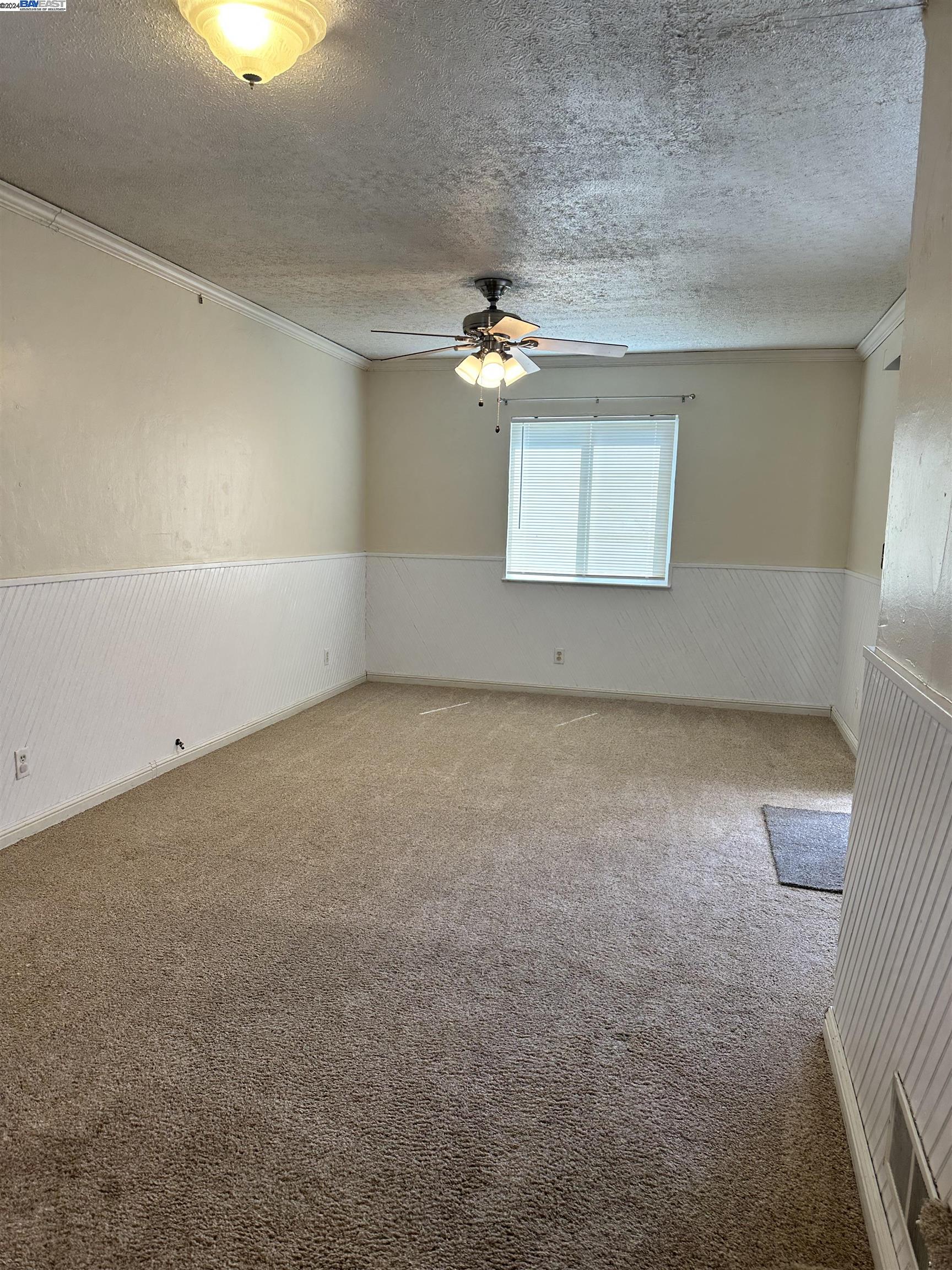 Carlton Square Livermore, CA 94550 - Photo 17 of 25 an empty room with a view of a kitchen
