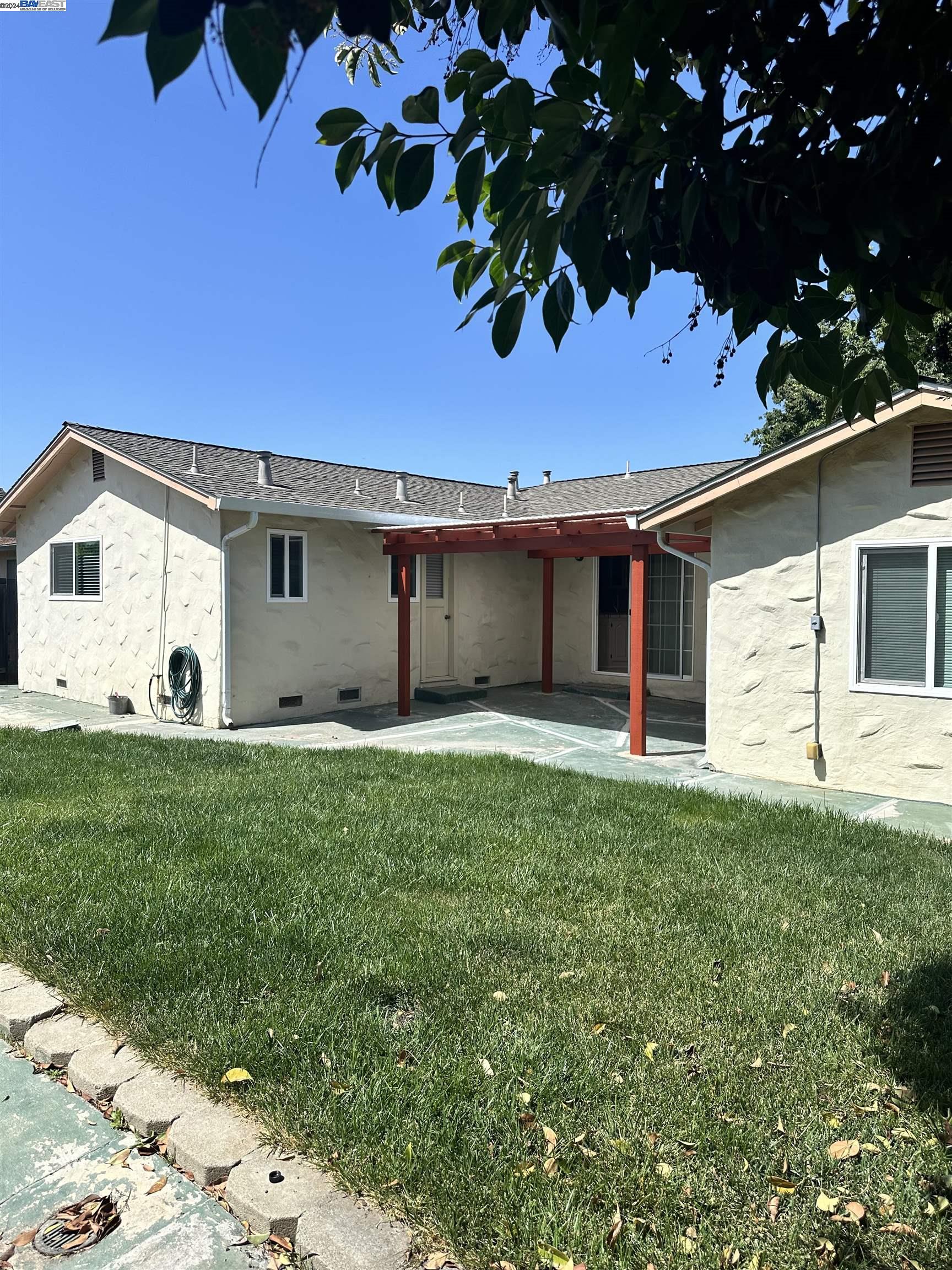 Carlton Square Livermore, CA 94550 - Photo 23 of 25 a view of a house with backyard