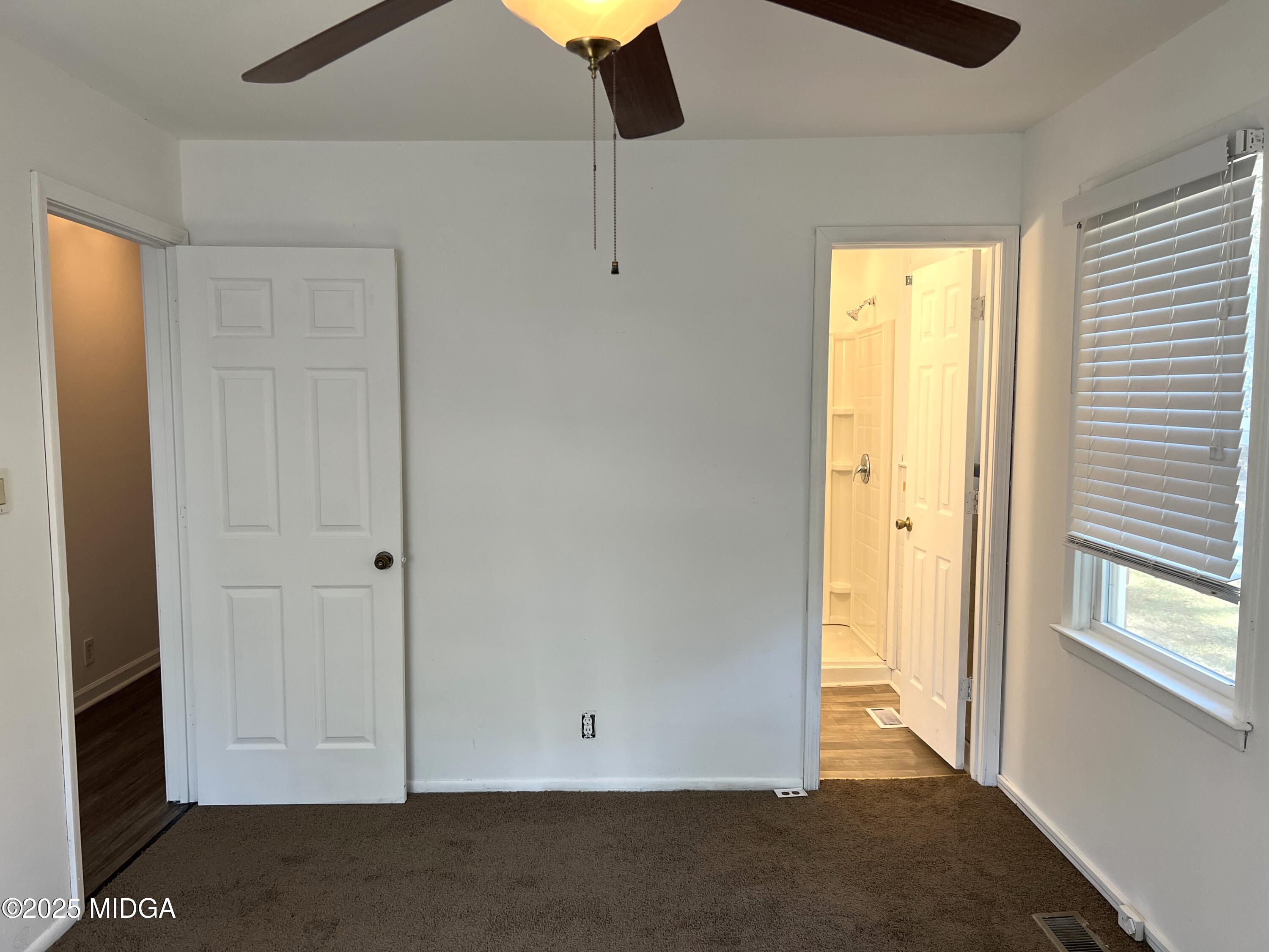 3347 Thunderbird Road Macon, GA 31217 - Photo 22 of 27 a view of an empty room with window