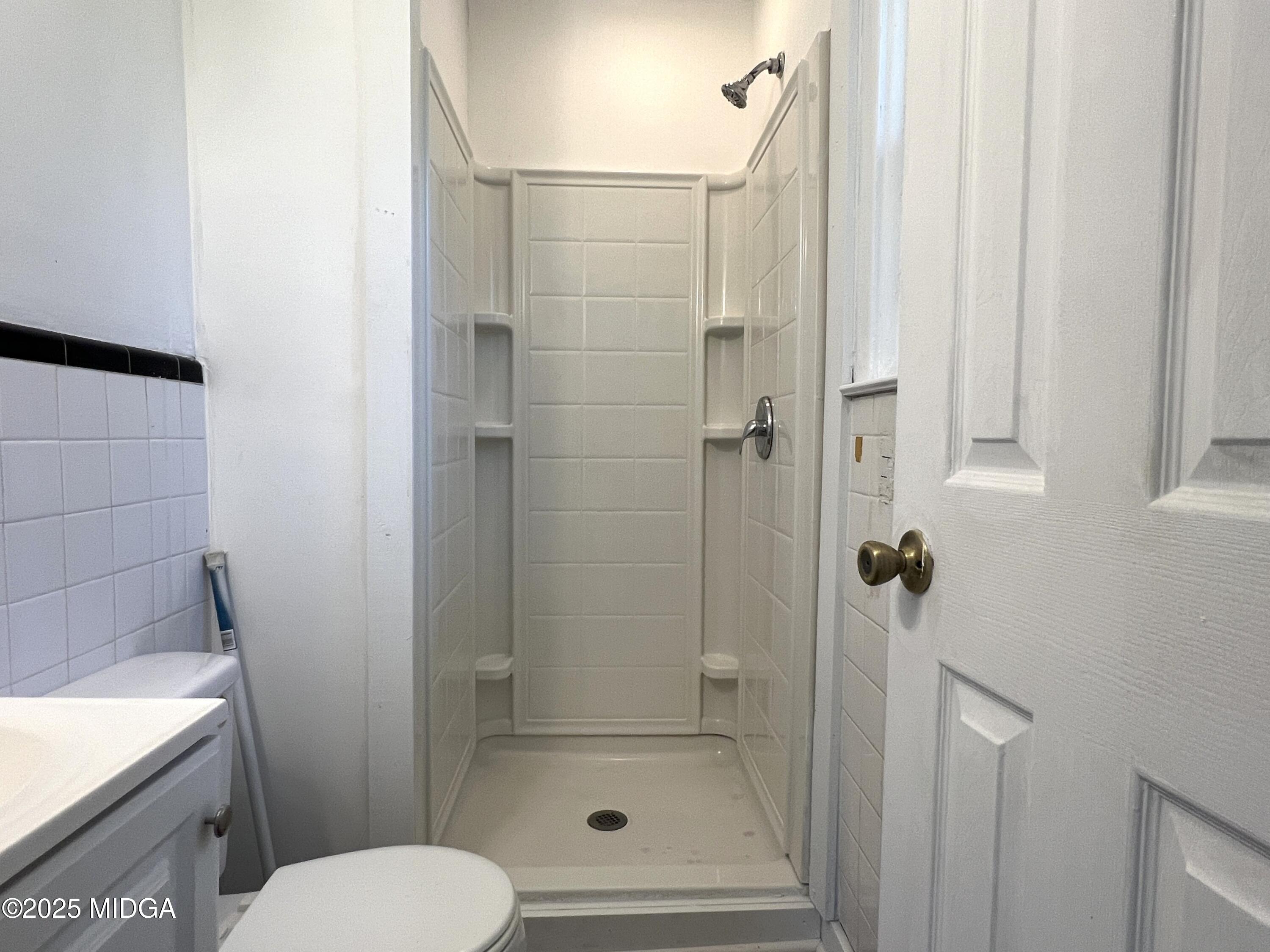 3347 Thunderbird Road Macon, GA 31217 - Photo 24 of 27 a bathroom with a shower and toilet