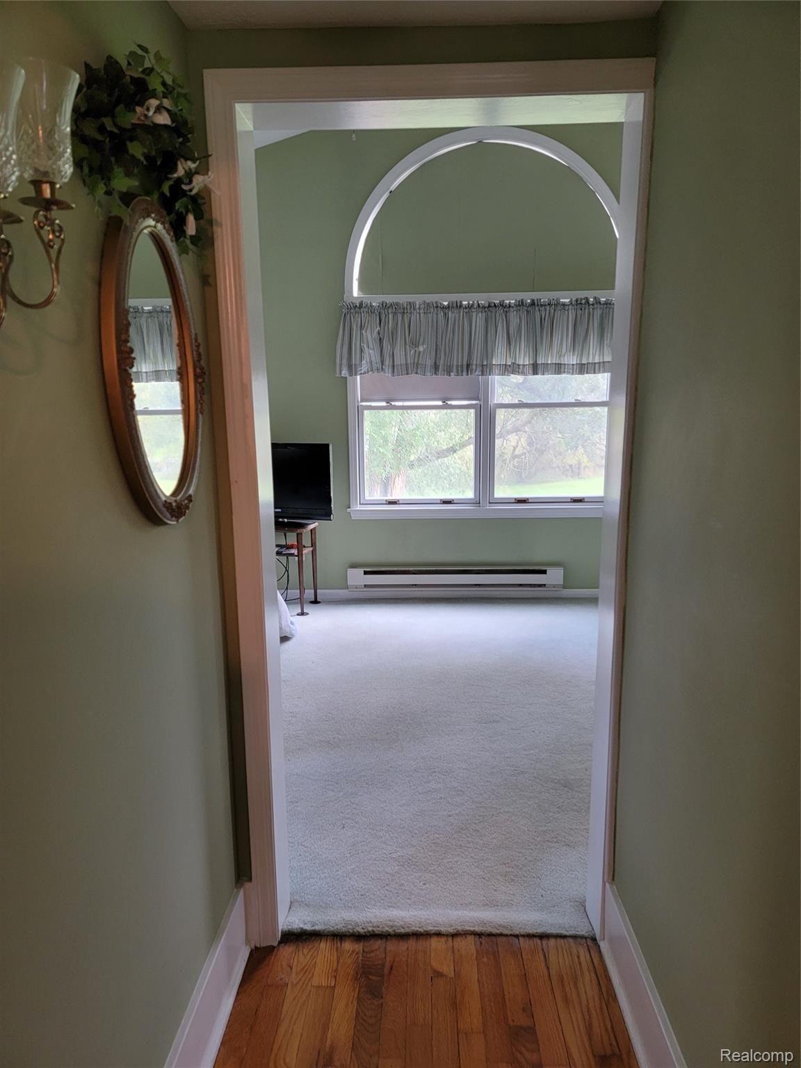 12749 Angle Road Bath, MI 48808 - Photo 13 of 33 Hall from Living Rm to Master Bed.jpg