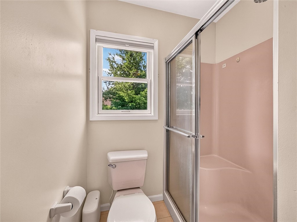 233 Dean Road Parma, NY 14559 - Photo 24 of 42 Another full bath in the primary bathroom.