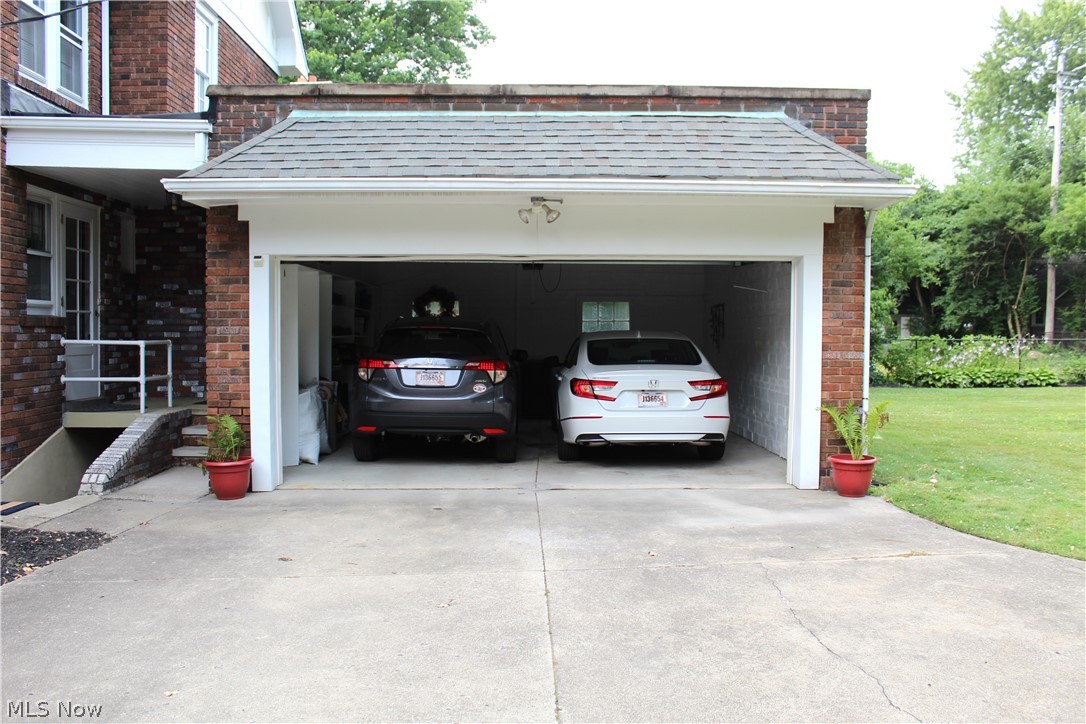 2977 Fontenay Road Cleveland, OH 44120 - Photo 27 of 32 Deep 2 car attached garage with built in shelving for plent of storage.