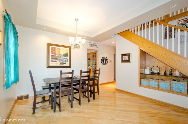 1025 Kent Avenue Park Ridge, IL 60068 - Photo 8 of 27 a view of a dining room with furniture and chandelier