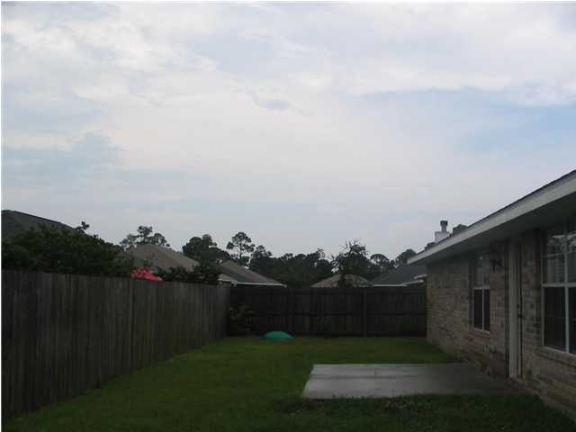 68 Inlet Drive Santa Rosa Beach, FL 32459 - Photo 3 of 10 a view of a backyard