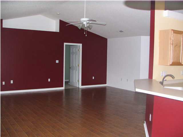 68 Inlet Drive Santa Rosa Beach, FL 32459 - Photo 5 of 10 a view of a livingroom with a kitchen