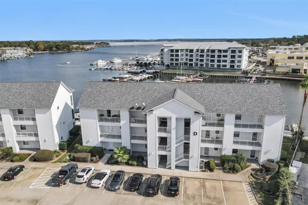 a view of a car park in front of house