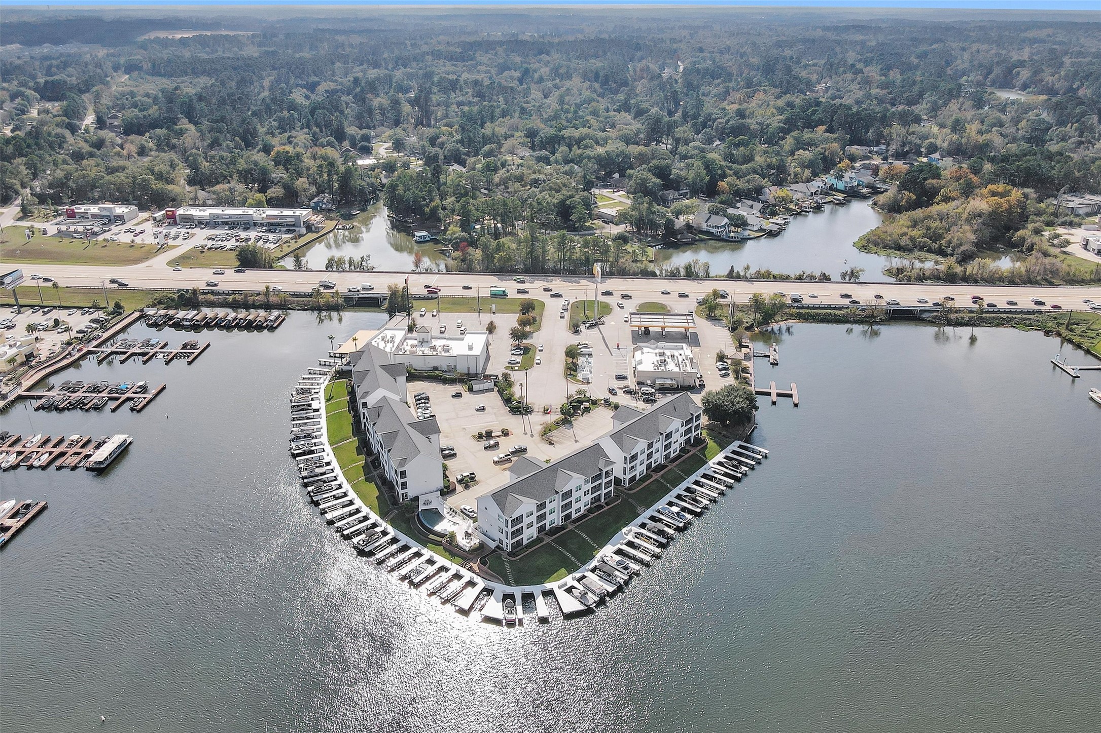 168 Lake Point Boulevard Montgomery, TX 77356 - Photo 7 of 34 an aerial view of a house with a lake view