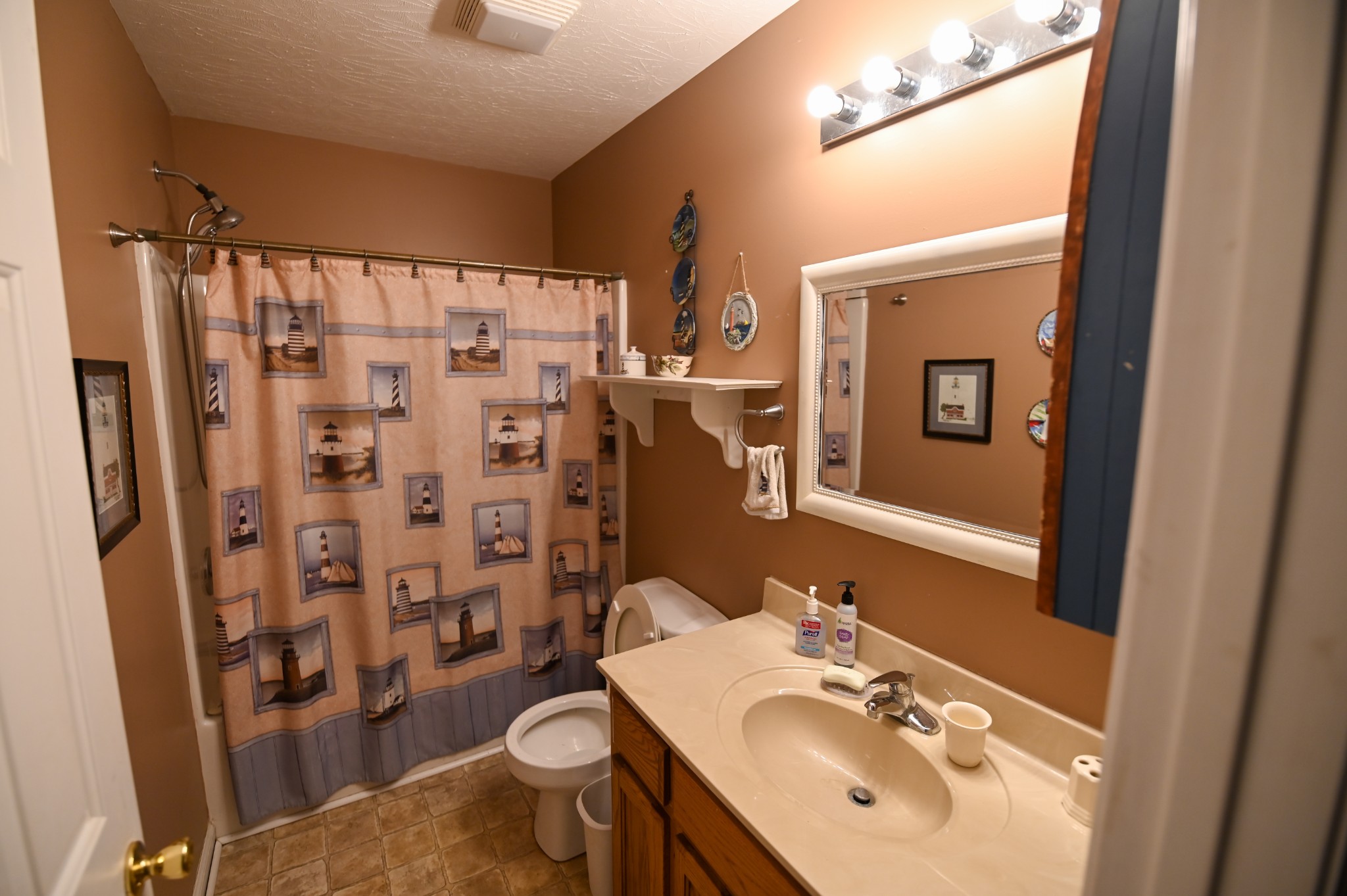 353 Stevens Circle Lafayette, TN 37083 - Photo 14 of 25 a bathroom with a sink toilet and shower