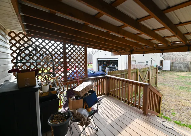 a view of a balcony with furniture