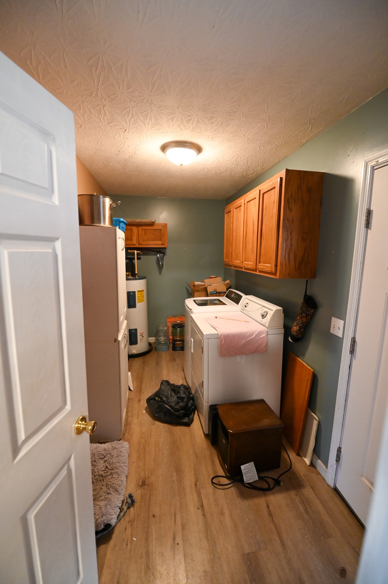 353 Stevens Circle Lafayette, TN 37083 - Photo 18 of 25 a utility room with closet dryer and washer