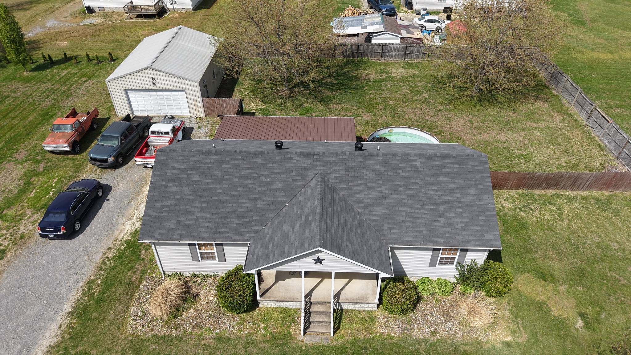 353 Stevens Circle Lafayette, TN 37083 - Photo 3 of 25 an aerial view of a house with a garden and lake view