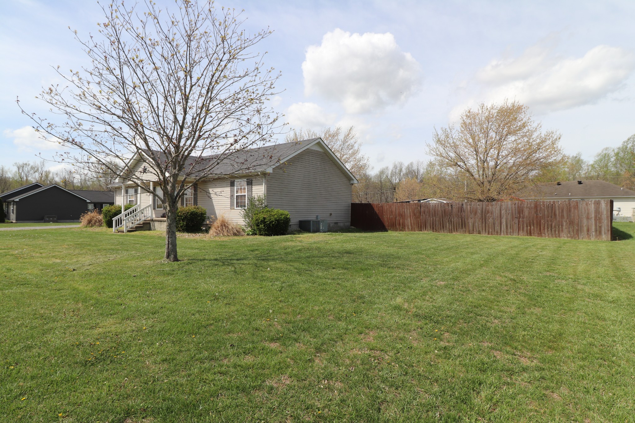353 Stevens Circle Lafayette, TN 37083 - Photo 4 of 25 a view of a house with yard and tree s