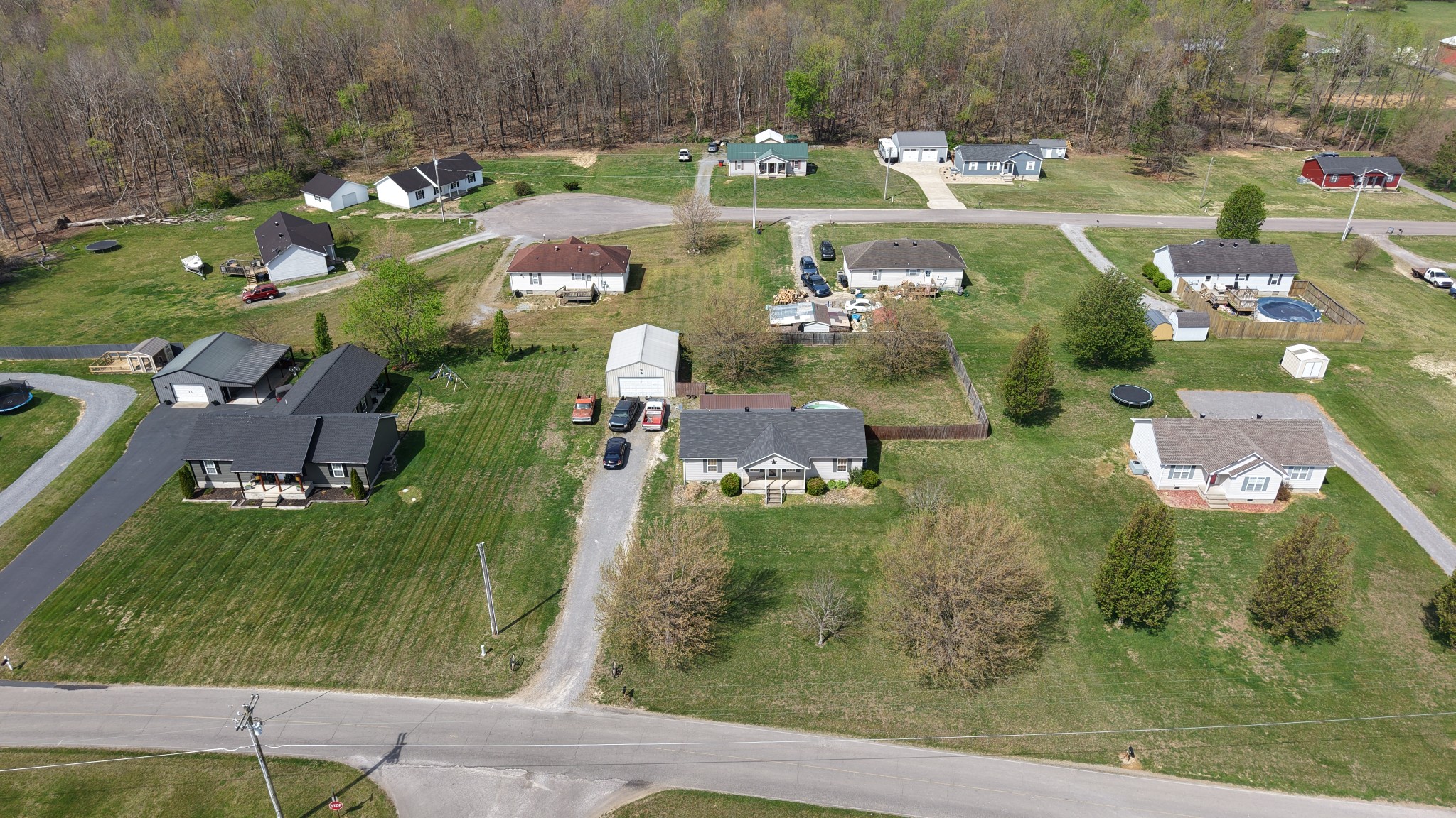 353 Stevens Circle Lafayette, TN 37083 - Photo 7 of 25 an aerial view of residential houses with outdoor space and street view