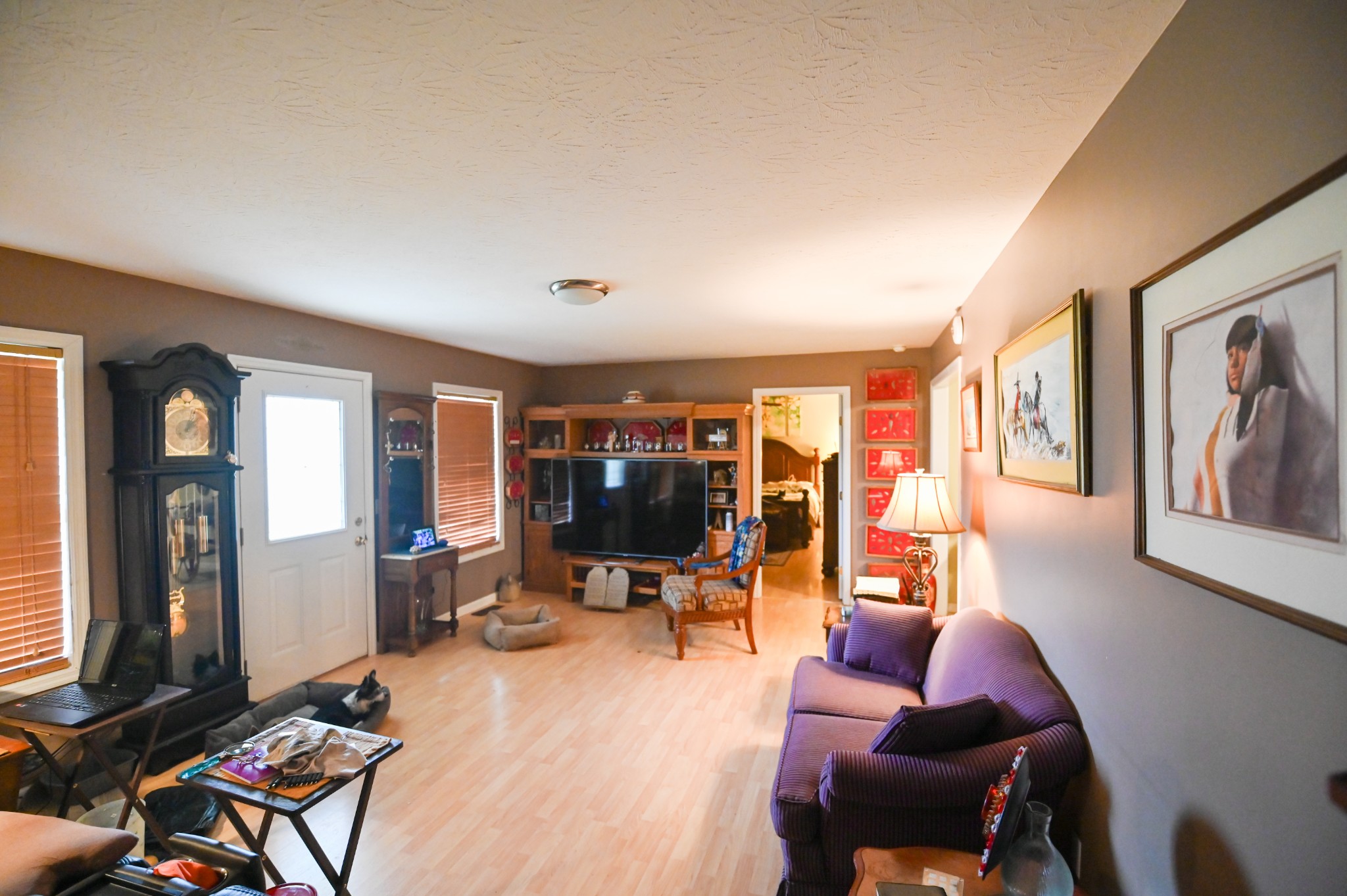 353 Stevens Circle Lafayette, TN 37083 - Photo 8 of 25 a living room with furniture gym equipment and large mirror