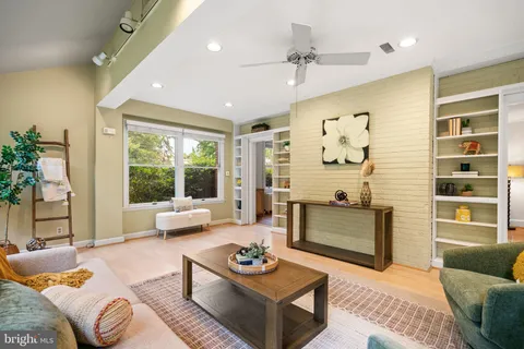 a bedroom with a bed and chair