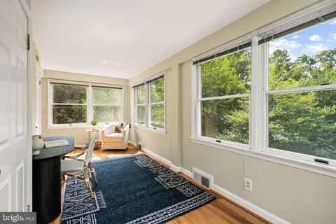 a bathroom with a shower and a shower