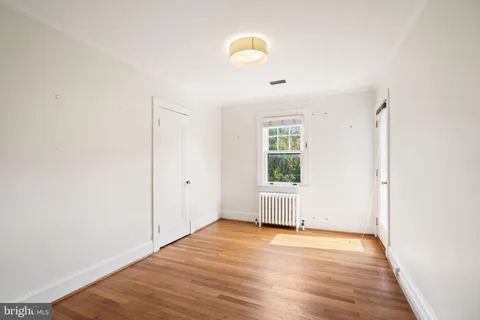 a view of a porch with a bench