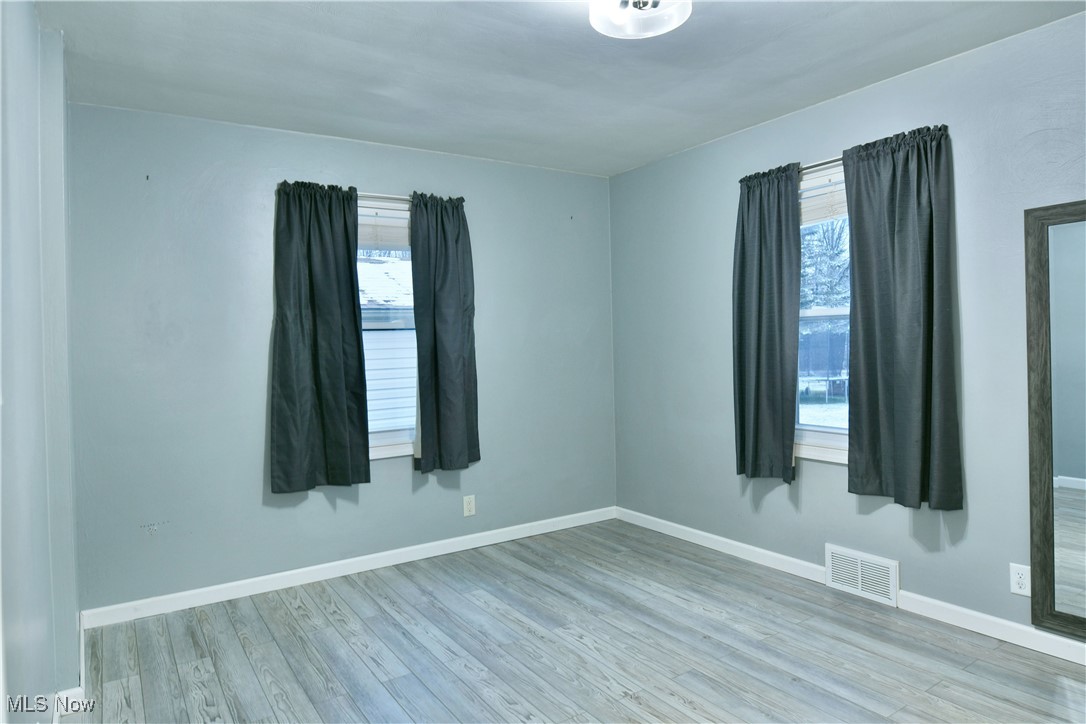 4335 Crew Hood Road Girard, OH 44420 - Photo 24 of 50 Unfurnished room with light hardwood / wood-style flooring