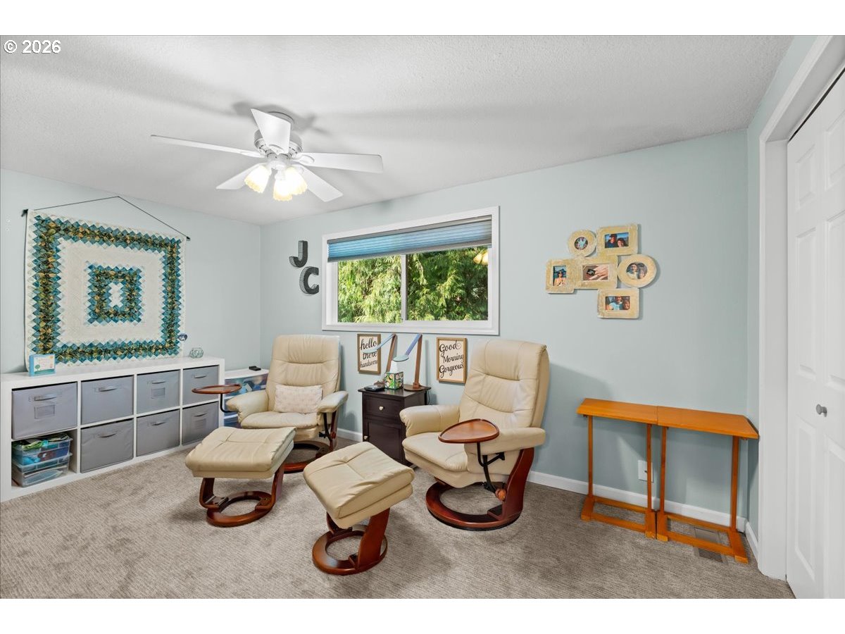 17110 South Potter Road Oregon City, OR 97045 - Photo 15 of 46 a living room with furniture a window and a chandelier