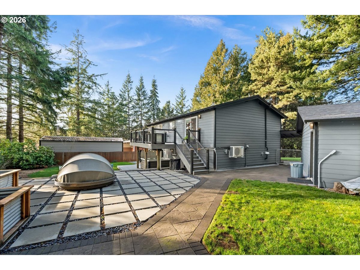 17110 South Potter Road Oregon City, OR 97045 - Photo 34 of 46 a backyard of a house with table and chairs